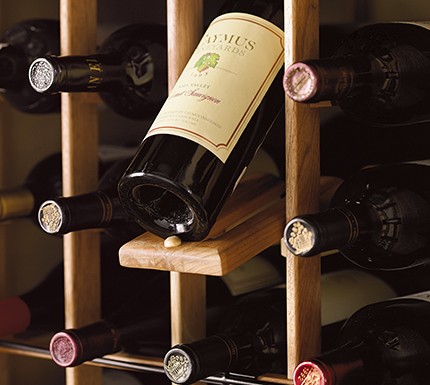 Presentation shelf in wine cabinet